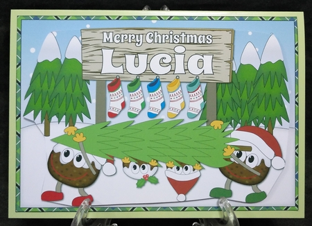 Crazy Christmas Puddings taking the Christmas Tree home and sign LUCIA by Suzi Cooper