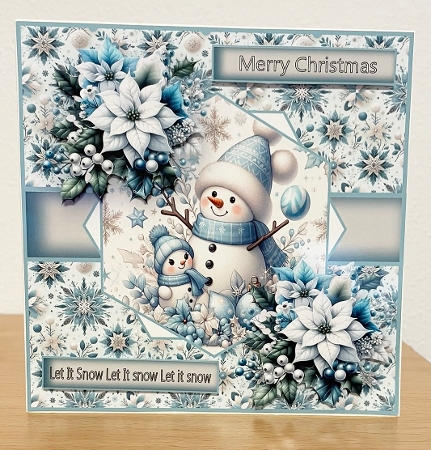 blue poinsettias snowman by Suzi Cooper