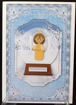 An Angel of Peace Snowglobe Decoupage Topper by Suzi Cooper