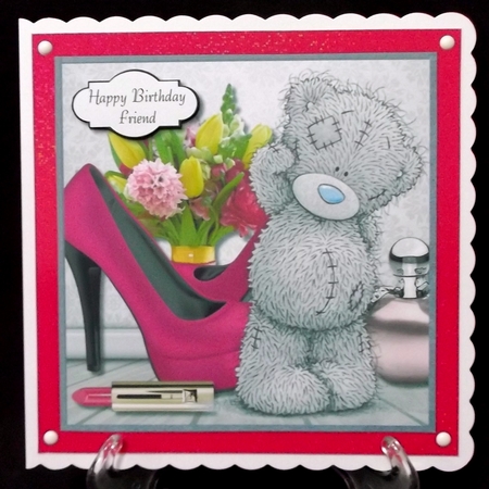 Tatty teddy with flowers, perfume and shoes by Suzi Cooper