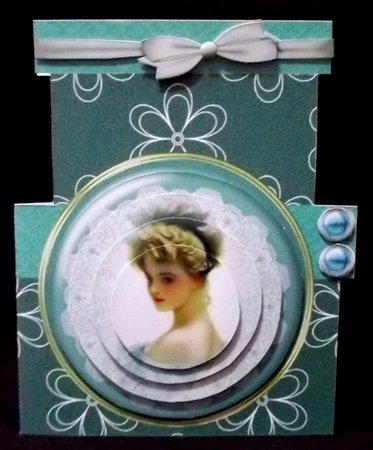 Blue lady on hat box shaped card by Suzi Cooper