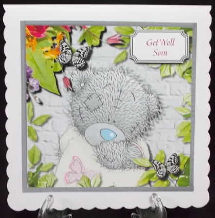Tatty teddy in floral frame by Suzi Cooper