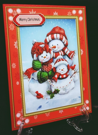 Gorgeous Snowman Family In Red Snowflake Frame by Suzi Cooper