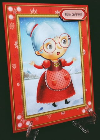 Gorgeous Mrs Claus In Red Snowflake Frame by Suzi Cooper