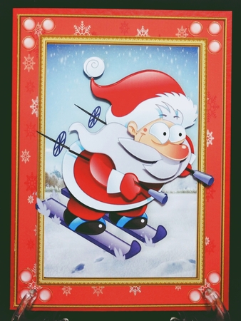 Gorgeous Skiing Santa In Red Snowflake Frame by Suzi Cooper