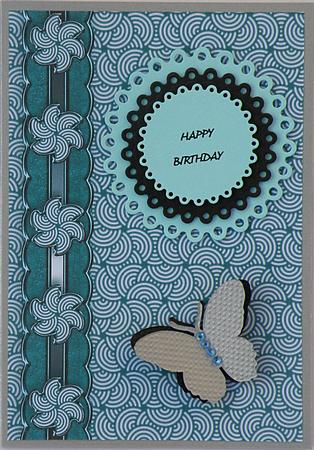 Teal Pinwheel with Suede Scalloped Border by Suzi Cooper