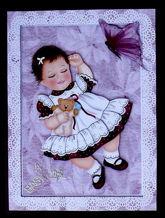 Baby Girl in Lace Frame Card Front by Suzi Cooper