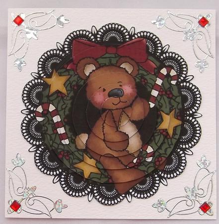 Christmas Teddy on Black Lace Background by Suzi Cooper
