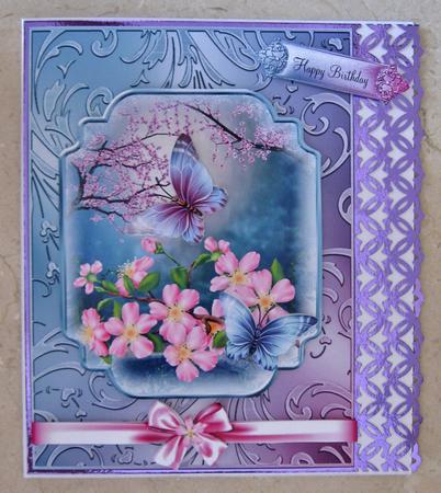 The Cherry Blossom Flutters in a Shimmering Frame by Suzi Cooper