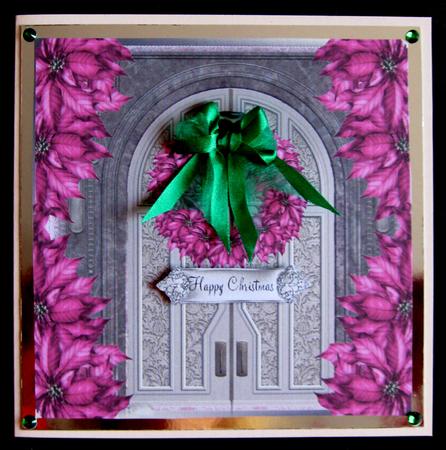 The Pink Poinsettia Wreath Door Topper by Suzi Cooper