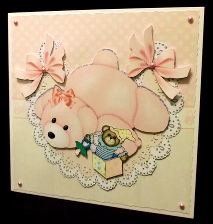 Pink Bear Laying Down with Jack in a Box on Lace Bib by Suzi Cooper