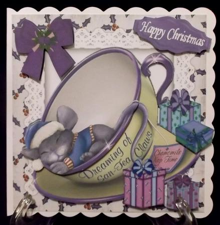 Sleepy Mouse in a Teacup in Blue Santa Hat by Suzi Cooper