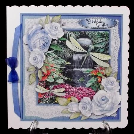 Beautiful Green Dragonflies and Blue Roses  by Suzi Cooper