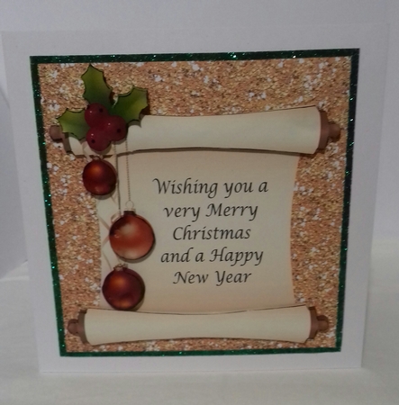 Scroll with baubles on 7x7 gold & green glitter backing. by Sylvia Sprot