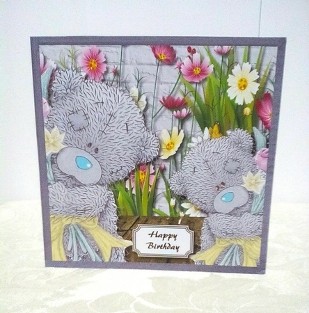 Tatty teddies with bouquets by Sylvia Sprot
