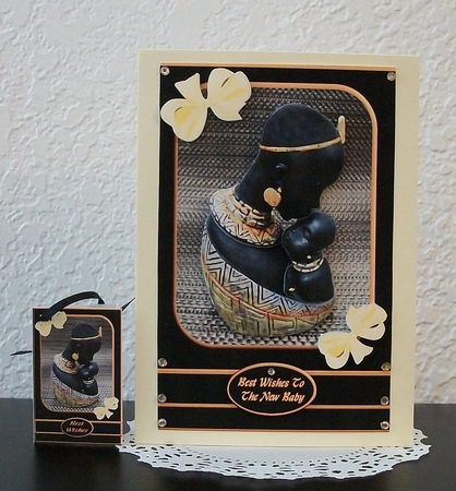 Ethnic Lady Kissing a Baby Sbs by Teddi Phillips
