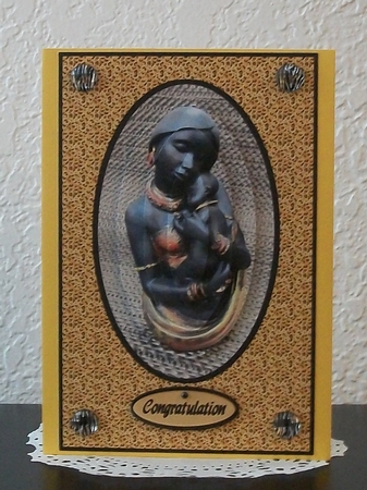 Ethnic Lady Holding a Baby Qs Oval by Teddi Phillips