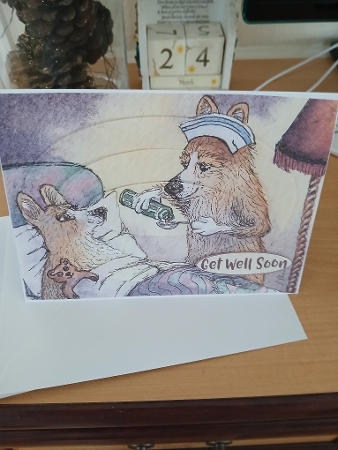 Corgi dog nurse and patient, oval pyramage by Teresa Lunn