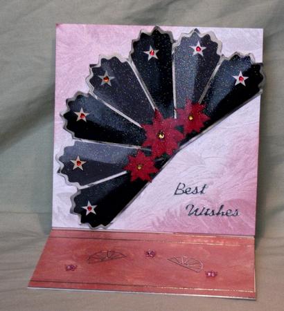 Star and Poinsettia Fan by Teresa Savin