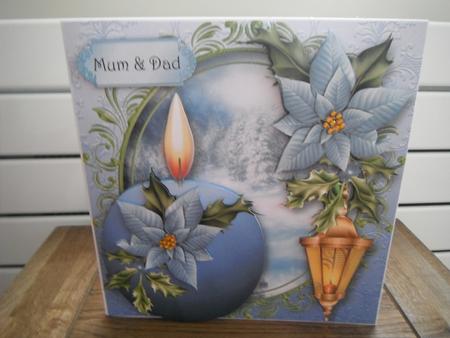 The Christmas Candle - Blue Poinsettias by Tina Fair