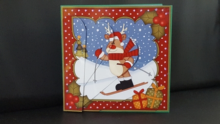 Christmas Rudolph goes Skiing Fan Pyramage Topper by Tracey Hutsby
