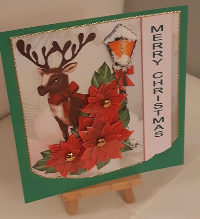 Reindeer & Poinsettias by Tracey Hutsby