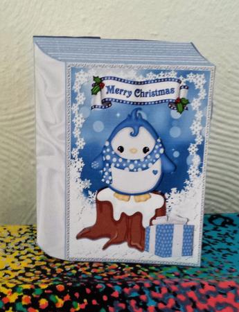 Cute Penguin in Spot Scarf, on a Snow Log Folded Book by Tracy Despard