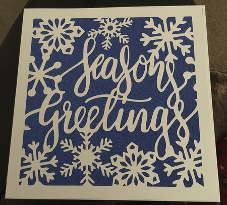 6 x 6 inch mat and topper cutting file Seasons Greetings surrounded by delicate snowflakes by Tracy Morley