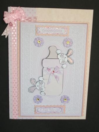 Bunny Bottle Baby Girl Card Front by Tracy Priddle