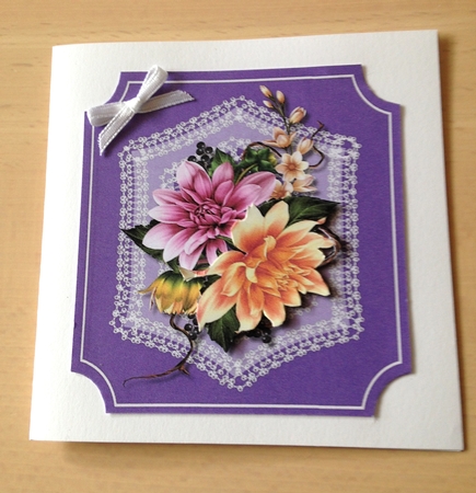 Beautiful Dahlias On Stunning Lace  by Ulla Skraedderdal