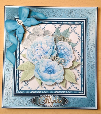 Stunning   Blue Roses in a Blue Frame  by Ulla Skraedderdal