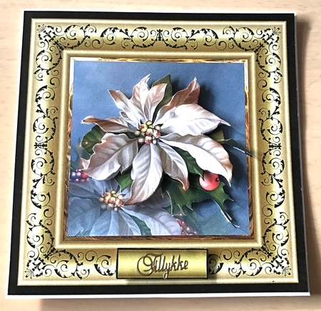 Festive poinsettia is a 7x7 card with large decoupage by Ulla Skraedderdal