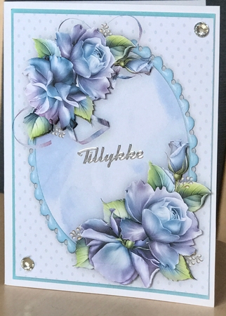 Blue Roses on a oval mat  by Ulla Skraedderdal