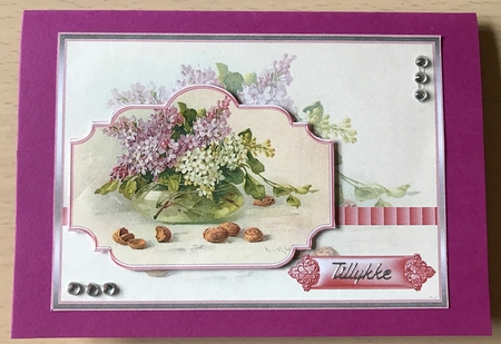 Vase of lilacs by Ulla Skraedderdal