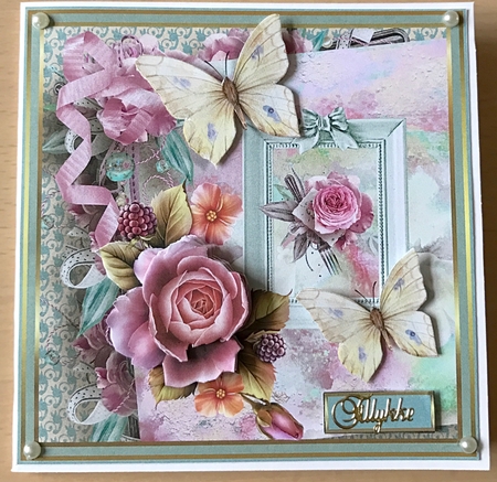Wild rose and butterfly by Ulla Skraedderdal