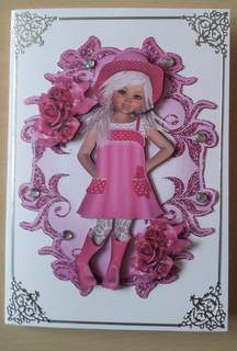 Little Girl in Pink Sun Hat and Wellies by Ulla Skraedderdal