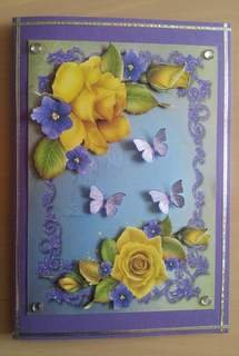 Beautiful Big Yellow Rose's with Little Blue Flowers by Ulla Skraedderdal