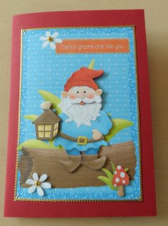 Lovely Little Gnome Sat on a Log by Ulla Skraedderdal