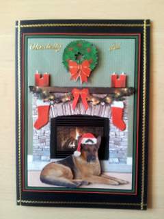 German Shepherd Christmas Fire Place Scene by Ulla Skraedderdal