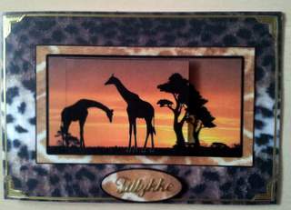 Giraffe in the Sunset by Ulla Skraedderdal