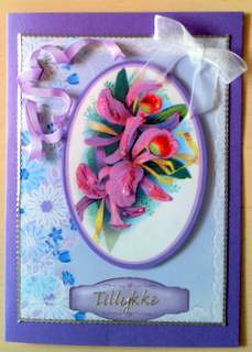 Beautiful Lilac Orchids on a Lace Background. by Ulla Skraedderdal
