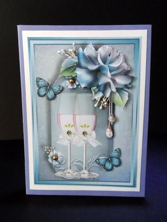 Champagne Glass's with Light Blue Roses A4 by Ulla Skraedderdal