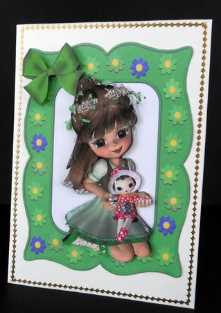 Little Girl in Flower Frame with Her Doll by Ulla Skraedderdal