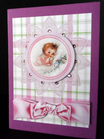 Baby Girl on Lace Flower with Bow A4 by Ulla Skraedderdal
