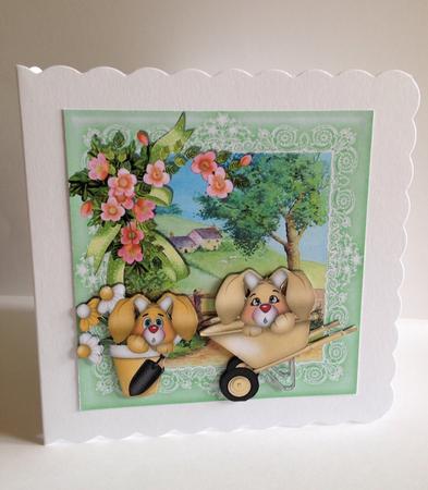 Cute Bunnies Gardening in the Meadow with Cottage 8x8 by Ulla Skraedderdal