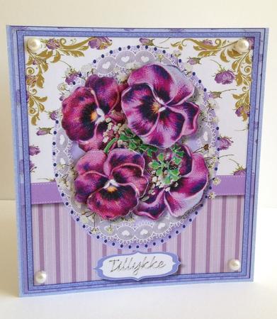 Beautiful Pansy's on Lace  by Ulla Skraedderdal