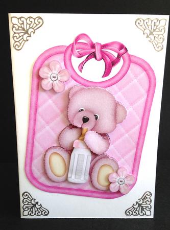 Gorgeous Little Pink Bear on a Bib Holding Bottle by Ulla Skraedderdal