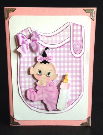 Cute Baby Girl with Her Blanket and Bottle Bib by Ulla Skraedderdal