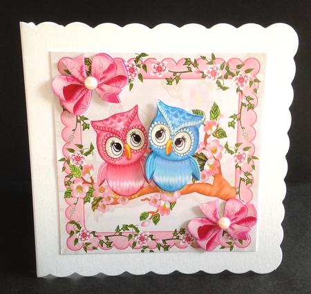Cute Pink/blue Owls on a Branch with Blossoms 8x8 by Ulla Skraedderdal