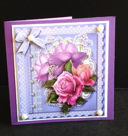 Lovely Beelop Roses on a Scalloped Frame  by Ulla Skraedderdal